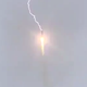 Ilustración para el artículo titulado El preciso instante en el que un cohete espacial ruso es alcanzado por un rayo en pleno vuelo